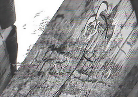 Überreste eines Graffito an der Berliner Mauer